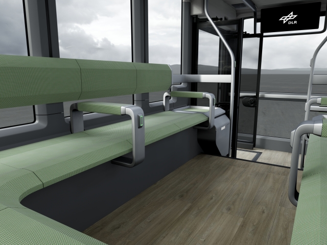 View-vehicle-interior-with-green-seating-grey-details-and-parquet-floor