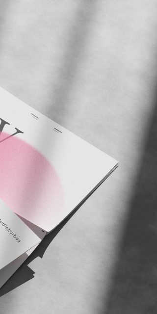 cropped-image-from-magazine-on-concrete-floor-with-cast-shadow-of-a-window