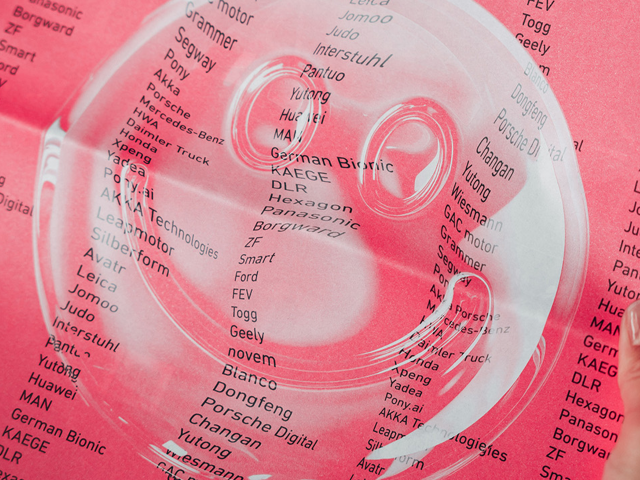 glass-smiley-on-pink-background-with-company-name-by-studiokurbos