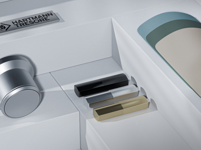 Various-material-samples-such-as-color-charts-or-the-Hartmann-logo-are-arranged-together-as-a-material-mood-board.