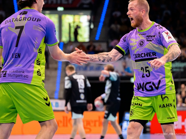 two-players-from-tvb-stuttgart-clap-eachother-during-sustainability-game-match