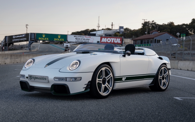 View-of-a-white-sports-car-with-green-details-on-a-race-track