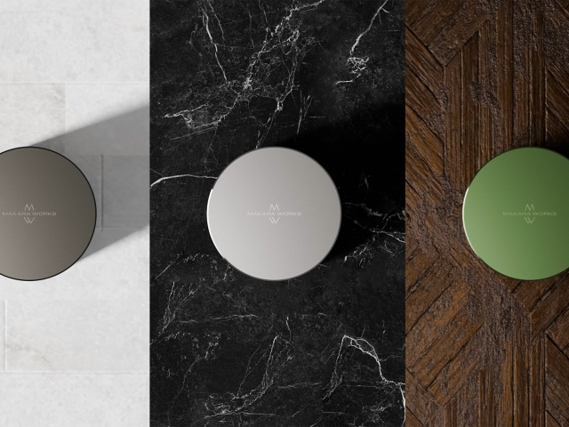 three-products-named-Kraken-next-to-the-side-up-in-top-view-in-different-colors-grey-white-green