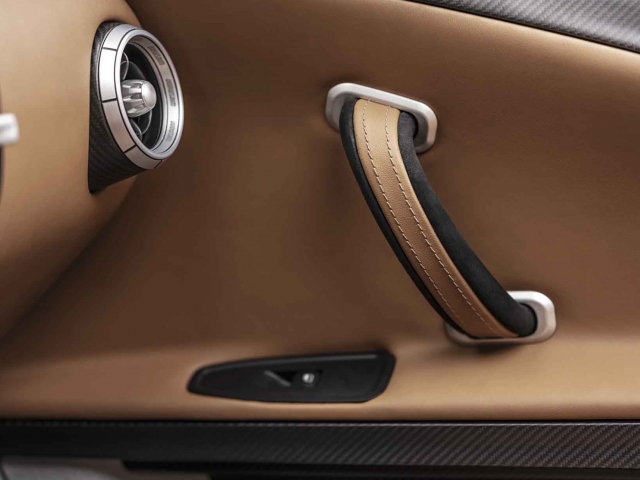 close-up-of-the-wiesmann-thunderball-interior-door-handle-brown-leather