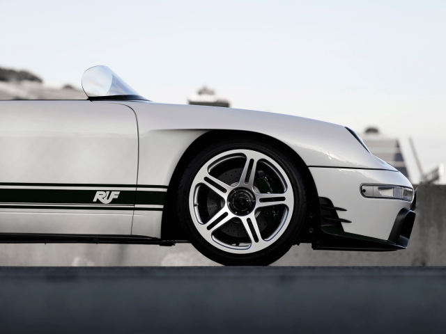 Photo-crop-of-a-white-sports-car-from-left-to-right-in-side-view