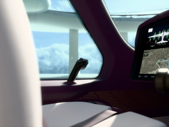 side-detail-view-of-the-pilot-seat-in-cream-white-with-screen-and-control-stick-on-the-left